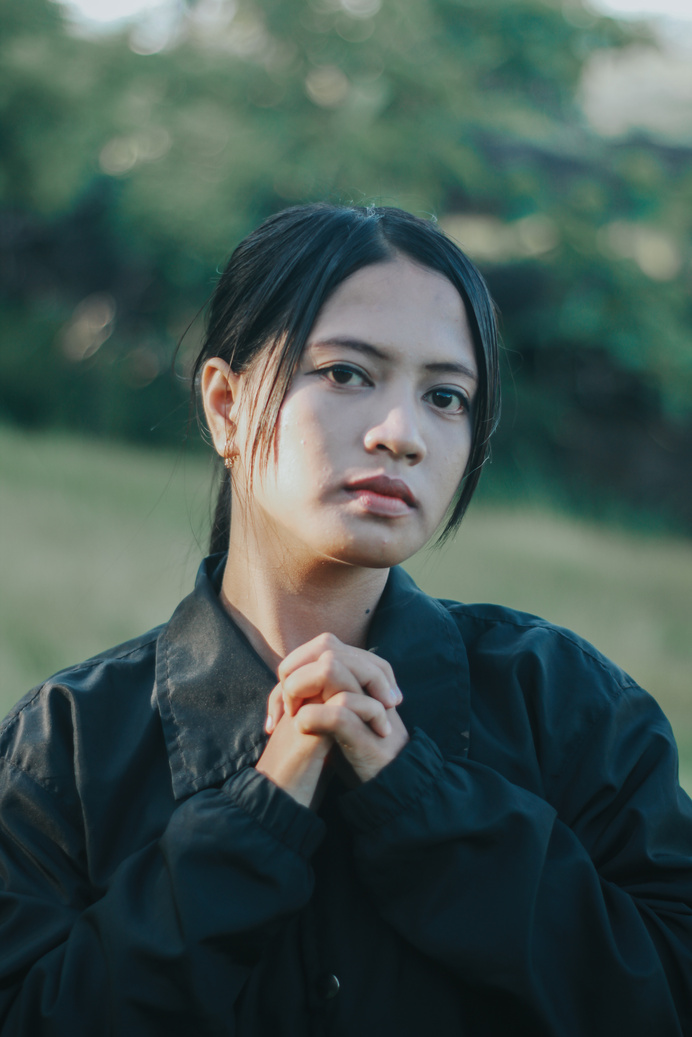 Woman In Black Jacket Standing